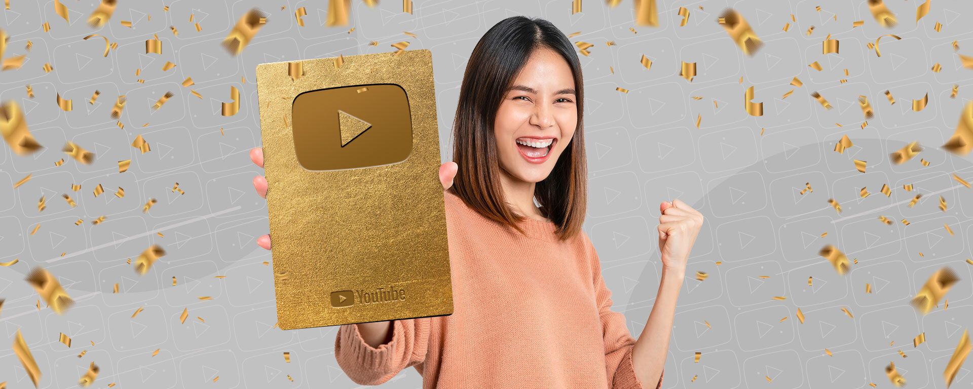 Image of a creator showing off her YouTube Creator Award.
